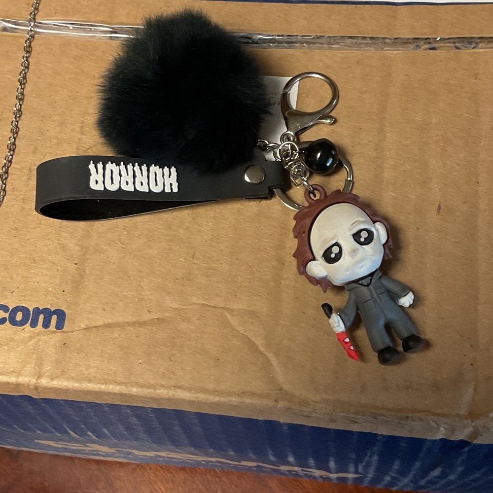 Horror Character Keychain with Black Pom Pom